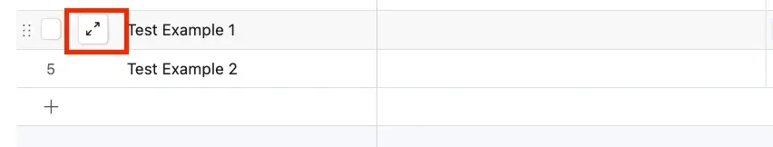 A grid row with the expand-record button highlighted — the arrows that appear on hover, just left of the record name.